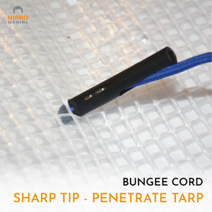 Sharp tip of bungee cord with toggle penetrating tarp material for easy installation without tools.