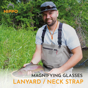 Lätta glasögon med 2,5x förstoring hänger på fiskarens bröst