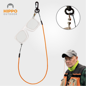 Flugfiskeglasögon med magnetfäste och orange band runt halsen