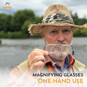 Angler showing the 8270 quick-release fly fishing magnifier designed for one-hand use