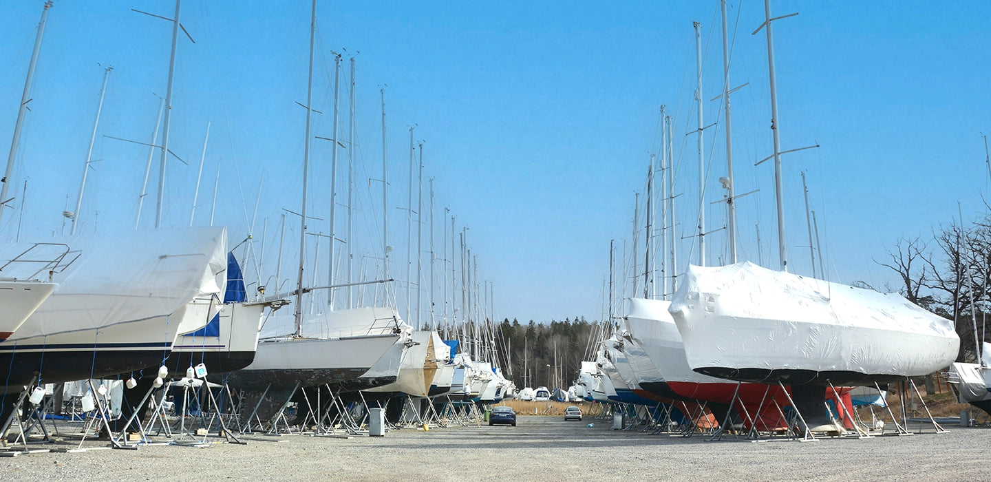 Tarp tape on tarpaulins in boat yards