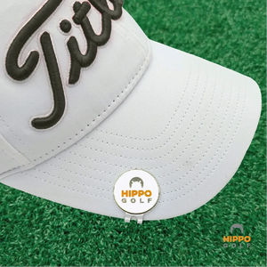 Ball marker with magnetic hat clip mounted on golf cap close up – 8103-08