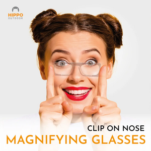 Woman using clip-on nose thin-optic magnifying glasses designed for threading needles and detailed sewing tasks