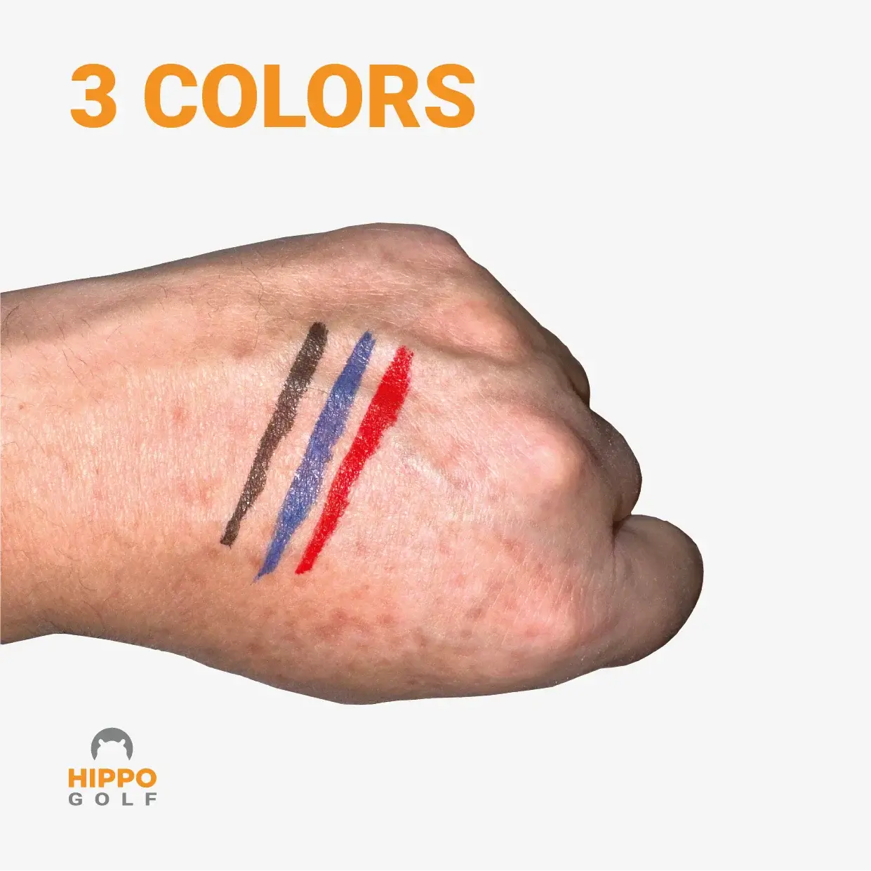 Face paint pens for Spot Golf showing three colors on hand – 8110-01