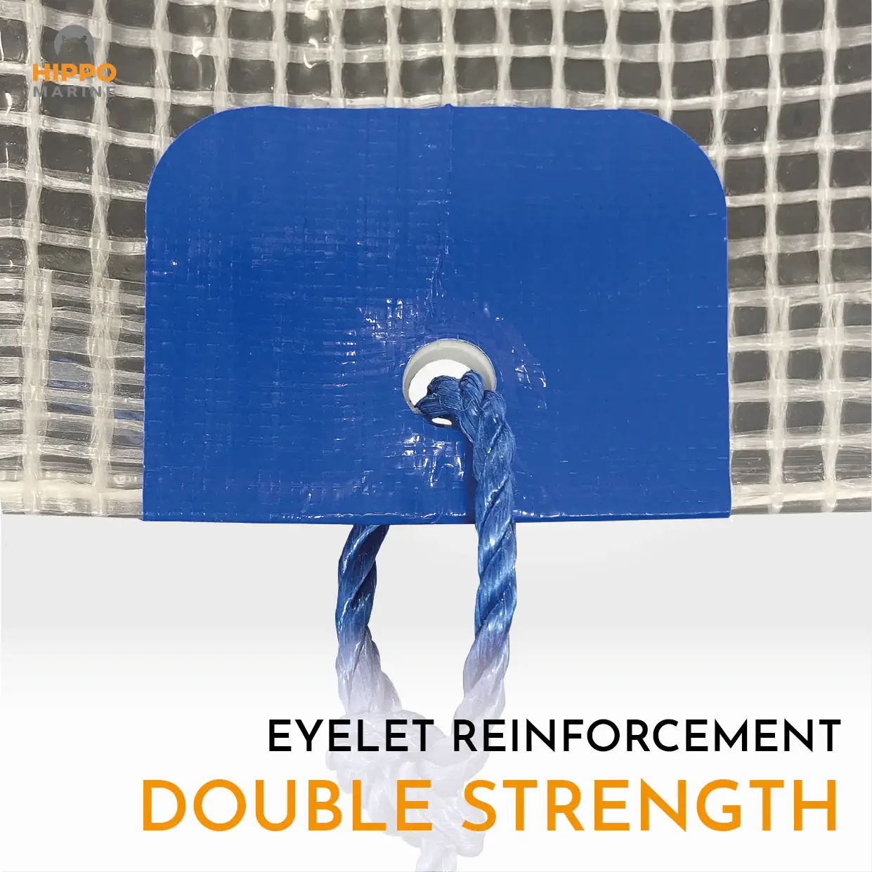 Reinforced tarp grommet with blue reinforcement patch providing extra durability for tie-down ropes.