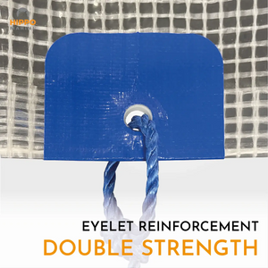 Reinforced tarp grommet with blue reinforcement patch providing extra durability for tie-down ropes.