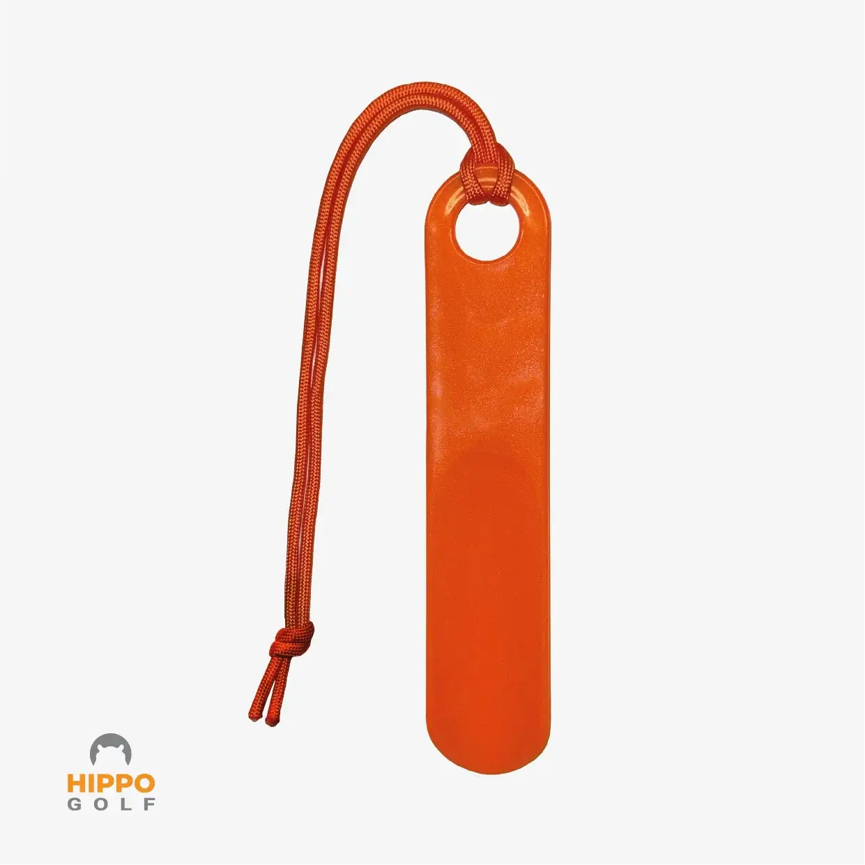 Portable orange shoehorn with hanging cord for golf shoes, compact design by Hippo Golf