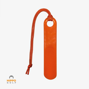 Portable orange shoehorn with hanging cord for golf shoes, compact design by Hippo Golf
