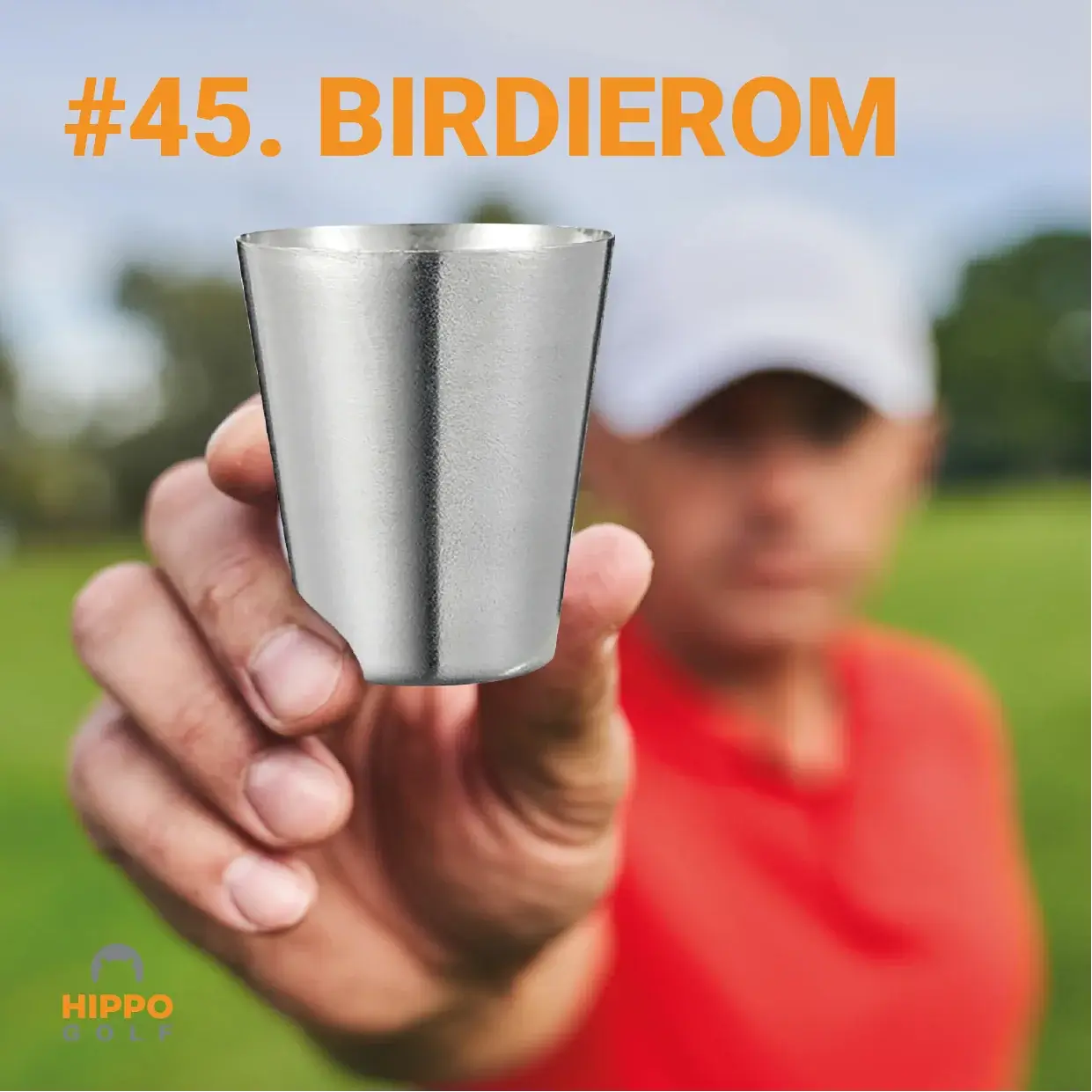 Metal shot glass held on a golf course representing the Birdierom drinking game after a birdie. 8190-05