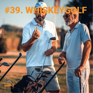 Two golfers laughing on the course while holding a shot glass during a relaxed whiskey golf round 8190-10.
