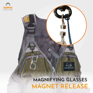Magnetic fly fishing magnifier 8275 attached to fishing vest with orange security band.