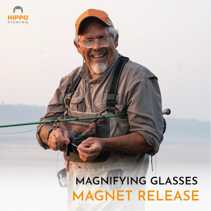 Magnetic fly fishing magnifier with grey band in action, showing easy magnet release during fly tying.