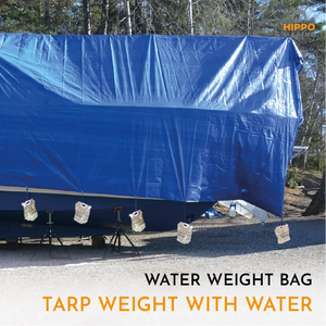 tarp weight water bags hanging from blue tarpaulin to keep cover tight