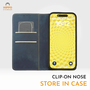 Thin reading glasses stored vertically inside a mobile phone case for easy access.