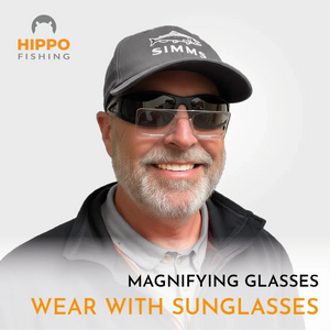 Magnifying glasses worn over sunglasses for improved fly-tying visibility.